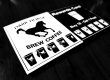 Dark Horse Brew Coffee Stamp Card laying on dark counter.